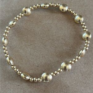 Like new enewton gold bracelet